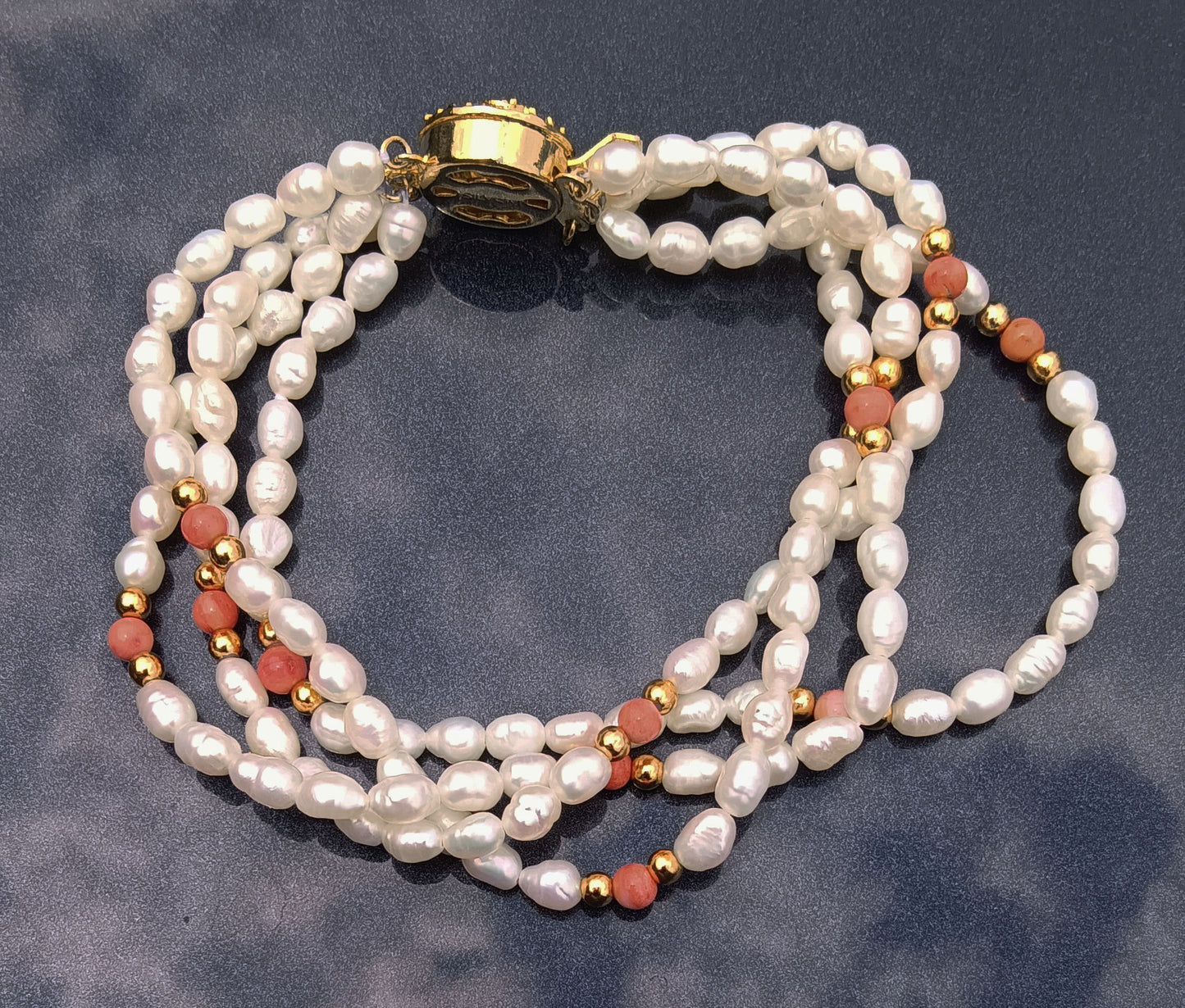 4 Strand Freshwater Rice Pearls and Angel Skin Coral Bracelet