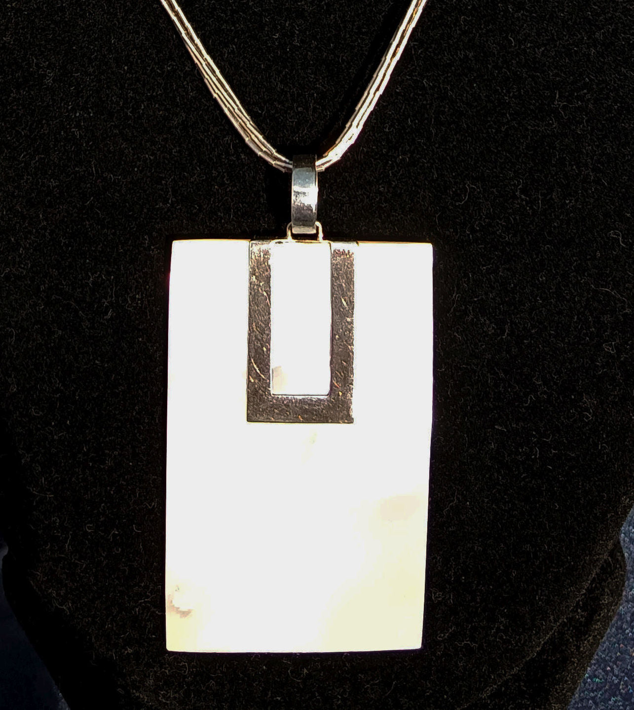 Mother of Pearl Pendant paired with 925 Schubes Liquid Silver Necklace